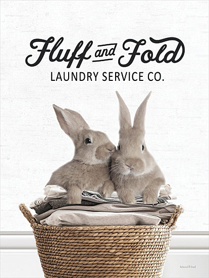 lettered & lined LET1331 - LET1331 - Fluff and Fold Bunnies - 12x16 fluff and fold laundry service co, rabbit pair, bunnies sitting on folded towels, woven basket, laundry room wall art, farmhouse laundry sign, black script typography, white background, neutral decor, whimsical animal print, vertical poster, cozy home decor, playful laundry artwork, lettered and lined from Penny Lane